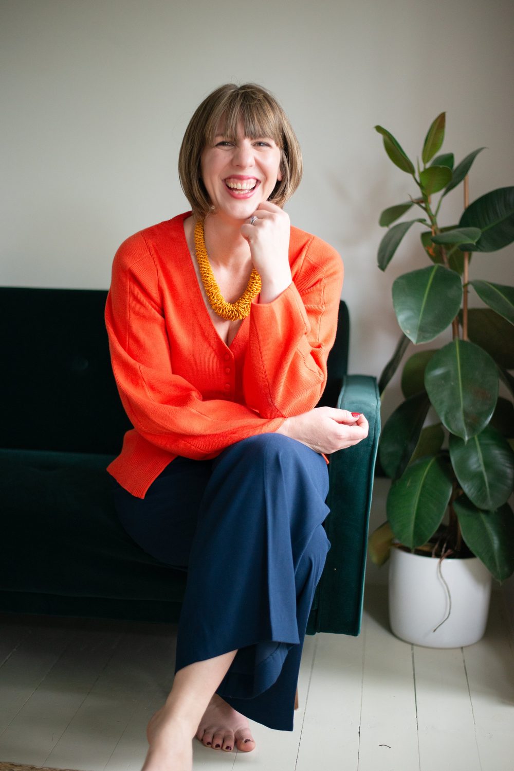 Sophie Griffiths in an orange cardigan